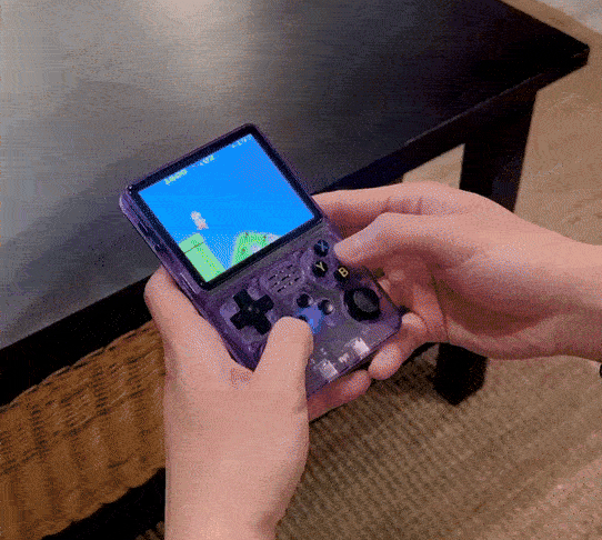 Close-up view of Retroboy Supreme handheld game console screen displaying Mario gameplay – 20,000+ retro games built-in